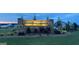Stone community entrance sign with lush landscaping, welcoming residents and guests at 632 Whitman Ln # 2034, Stockbridge, GA 30281