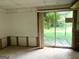Basement with sliding glass door and natural light, ready for customized finishing at 8832 Twin Oaks Dr, Jonesboro, GA 30236
