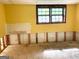 Unfinished basement with natural light offers customization for a Gathering room or storage at 8832 Twin Oaks Dr, Jonesboro, GA 30236