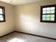 Bedroom featuring natural light from two windows at 8832 Twin Oaks Dr, Jonesboro, GA 30236