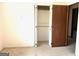 Bedroom with open closet shows ample storage space at 8832 Twin Oaks Dr, Jonesboro, GA 30236