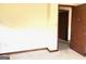 Bedroom with doorway and neutral walls, offering space to relax at 8832 Twin Oaks Dr, Jonesboro, GA 30236