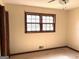 Bedroom with ceiling fan and window at 8832 Twin Oaks Dr, Jonesboro, GA 30236