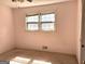 Bedroom with natural light and an exterior view, ready for renovation and personalization at 8832 Twin Oaks Dr, Jonesboro, GA 30236