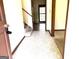 View of Foyer with tile flooring and staircase at 8832 Twin Oaks Dr, Jonesboro, GA 30236