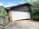 Leaning garage door needs repair or replacement at 8832 Twin Oaks Dr, Jonesboro, GA 30236