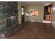 View of Living room featuring brick fireplace and hardwood flooring at 8832 Twin Oaks Dr, Jonesboro, GA 30236