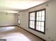 Bright living room featuring large windows and natural light at 8832 Twin Oaks Dr, Jonesboro, GA 30236
