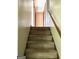 Carpeted stairs leading to the second floor, ready for Gathering and guests at 8832 Twin Oaks Dr, Jonesboro, GA 30236