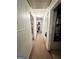 Neutral hallway with carpet and white walls at 3683 Miller St, Lithia Springs, GA 30122