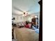Cozy living room with neutral paint, ceiling fan, and lots of natural light at 3683 Miller St, Lithia Springs, GA 30122