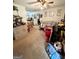 Cozy living room with neutral paint, ceiling fan, and lots of natural light at 3683 Miller St, Lithia Springs, GA 30122
