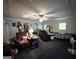 Spacious living room with ceiling fan, and lots of seating at 3683 Miller St, Lithia Springs, GA 30122