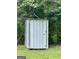 Functional outdoor metal shed for storing tools and equipment in the backyard at 3683 Miller St, Lithia Springs, GA 30122