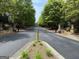 The community gate provides security and privacy, surrounded by lush greenery and a well-maintained entrance at 2873 Shoals Hill Ct, Dacula, GA 30019