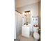This bathroom features a vanity, toilet, and shower/bath with neutral walls and flooring at 10 Stagg Trce, Social Circle, GA 30025