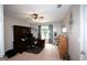 Comfortable office space with a ceiling fan, carpeting, and large desk, ideal for working from home at 10 Stagg Trce, Social Circle, GA 30025