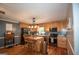 Bright kitchen features light wood cabinets, stainless appliances, an island and an adjacent dining area with backyard access at 10 Stagg Trce, Social Circle, GA 30025