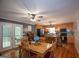 Bright kitchen features light wood cabinets, stainless appliances, an island and an adjacent dining area with backyard access at 10 Stagg Trce, Social Circle, GA 30025