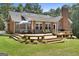 Charming brick home featuring a spacious back deck perfect for outdoor entertaining at 1000 Turner Church Rd, Mcdonough, GA 30252