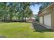 Spacious backyard featuring a play area and a view of the main house at 1000 Turner Church Rd, Mcdonough, GA 30252
