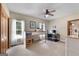 Spacious bedroom with a bunk bed, ceiling fan, carpet and natural light from two windows at 1000 Turner Church Rd, Mcdonough, GA 30252