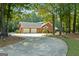 Spacious home featuring a circular driveway and a two-car garage at 1000 Turner Church Rd, Mcdonough, GA 30252