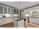 Updated kitchen with granite countertops, stainless appliances, and white cabinetry at 1000 Turner Church Rd, Mcdonough, GA 30252