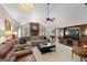 Bright living room with high ceilings, a fireplace, and cozy seating arrangement at 1000 Turner Church Rd, Mcdonough, GA 30252