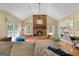 Cozy living room with a brick fireplace, large windows, and comfortable seating at 1000 Turner Church Rd, Mcdonough, GA 30252