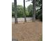 Large treed backyard with a wooden fence at 3381 Walkers Ridge Rd, Dacula, GA 30019