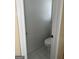 The bathroom features a toilet and tile flooring at 3381 Walkers Ridge Rd, Dacula, GA 30019