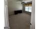 Bedroom featuring carpeted flooring, ceiling fan, desk, and a window with blinds at 3381 Walkers Ridge Rd, Dacula, GA 30019