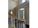 Bright foyer with stairs, tile floors, and natural light creates a welcoming entrance at 3381 Walkers Ridge Rd, Dacula, GA 30019