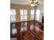 Open living area with hardwood floors, a ceiling fan, and natural light at 3381 Walkers Ridge Rd, Dacula, GA 30019