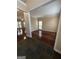Open-concept living room featuring hardwood floors and ample natural light at 3381 Walkers Ridge Rd, Dacula, GA 30019