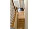 Staircase featuring hardwood steps and white railings leading to the entrance at 3381 Walkers Ridge Rd, Dacula, GA 30019