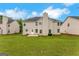 The property features a well-manicured backyard at 907 Brisley Cir, Hampton, GA 30228