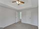 Bedroom featuring neutral walls, carpet floors, and two closets at 907 Brisley Cir, Hampton, GA 30228