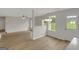 Open floor plan living room featuring hardwood floors and lots of natural light at 907 Brisley Cir, Hampton, GA 30228