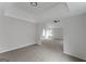 Spacious main bedroom features neutral colors and plush carpet flooring at 907 Brisley Cir, Hampton, GA 30228