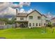 Expansive backyard with green grass, patio, and partial fencing at 150 Bellemeade Ct, Fayetteville, GA 30215