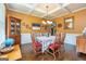 Elegant dining room with hardwood floors and stylish furniture, perfect for Gathering meals at 150 Bellemeade Ct, Fayetteville, GA 30215