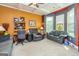 Comfortable living room with an array of seating options and large windows at 150 Bellemeade Ct, Fayetteville, GA 30215