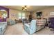 Cozy living room with a ceiling fan and comfortable seating at 150 Bellemeade Ct, Fayetteville, GA 30215