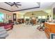 Expansive recreation room with gym, seating area and bedroom area perfect for multiple activities and relaxation at 150 Bellemeade Ct, Fayetteville, GA 30215