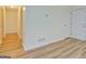 Inviting living room features hard surface floors, neutral paint, and white trim at 4547 Atha Cir, Loganville, GA 30052