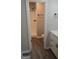 This bathroom features a white vanity, walk-in shower, toilet, and updated fixtures at 6286 Saddlewood Dr, Lithonia, GA 30058