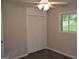 Bedroom with closet, window, and luxury vinyl plank floors at 6286 Saddlewood Dr, Lithonia, GA 30058