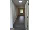 Inviting entryway boasts newly installed floors and leads into a spacious living area with natural light at 6286 Saddlewood Dr, Lithonia, GA 30058